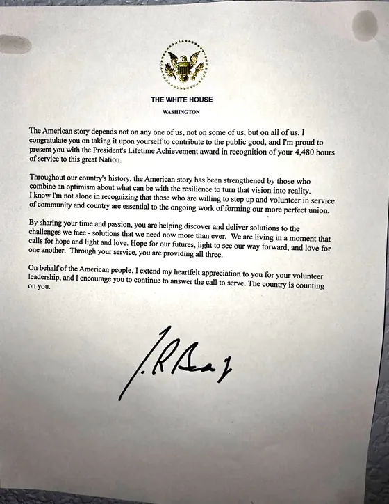 Letter from the White House congratulating the recipient of the President’s Lifetime Achievement Award for 4,480 hours of service.
